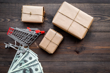 Parcels box in delivery service office wooden background top view space for text