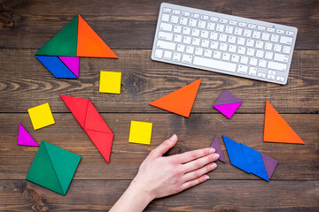 pieces of bright paper for puzzle on wooden office background top view mockup