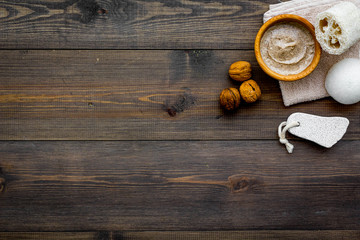 Homemade spa with organic scrub and peanut on wooden background top view space for text