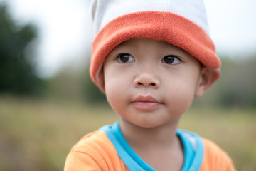 Little happy boy smiling In Park