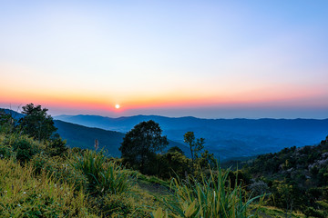 Phu Chi Fah in Chiang Rai,Thailand at sunset.Phu Chi Fah, is a mountain area and national forest park. it is one of the famous tourist attractions of the Thai highlands near Chiang Rai.