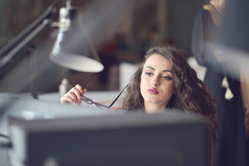 Woman entrepreneur busy with her work in office.