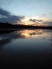 Pôr do Sol Sobre Poça D'água