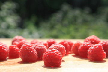 ripe raspberry is on the table.