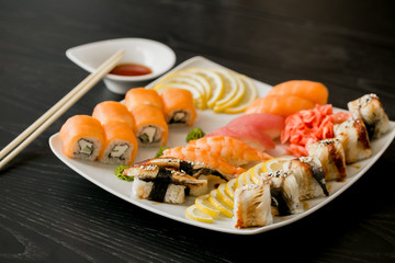 fresh sea food at sushi restaurant. free set of sushi. food reach in microcells. Japanise cuisine. raw seafood