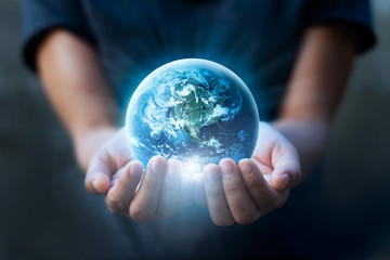 Earth day, Human hands holding blue earth, save earth concept. Elements of this image furnished by NASA - obrazy, fototapety, plakaty
