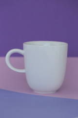 tableware mockup. Minimalist cup Mockup. white cup on a trend lilac pink graphic background. tableware mockup in trendy pastel tones.copy space