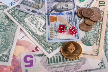Ethereum coin lying on euro and dollar banknotes with red Dice. Concept blockchain, cryptocurrencies, investment