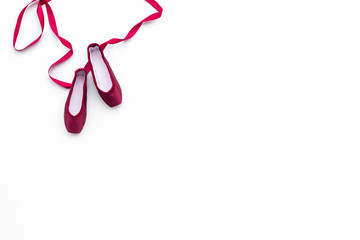 Professional dance shoes. Ballet concept. Pointes on white background top view copy space