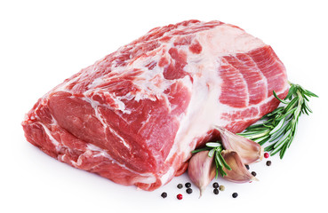 Fresh raw pork neck meat, garlic, pepper and rosemary isolated on white background.