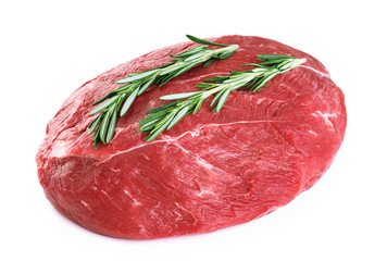 Raw beef meat and rosemary isolated on white background.