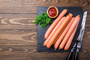 Raw frankfurter sausages