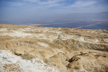 Fototapeta na wymiar Top view of the Dead Sea through the mountains of the Yehuda desert