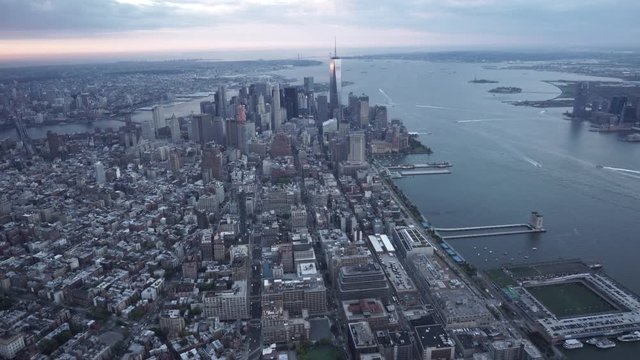 New York City wide angle aerial view flying toward Lower Manhattan from Grenwich Village.