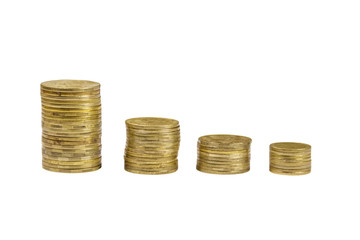 Stacks of golden coins isolated on white background