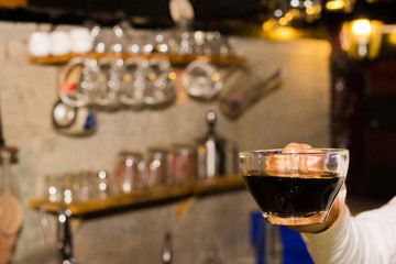 Woman holding cup of coffee. coffee shop