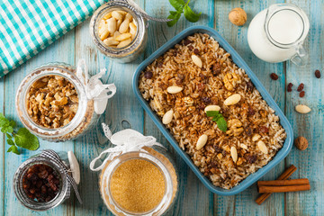Traditional, mexican baked sweet rice, with almonds, raisins and walnuts.