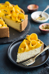 slice of mango and passion fruit cheesecake