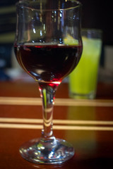 Pouring red wine into the glass