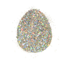 Easter egg of silver holographic glitter on white background, holiday decoration