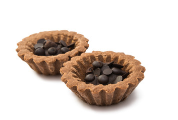 basket with chocolate drops isolated