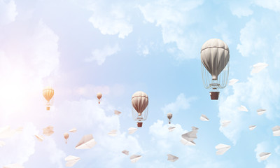 Flying hot air balloons in the air.