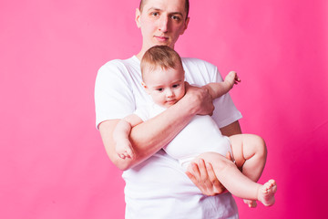 Father holds his baby
