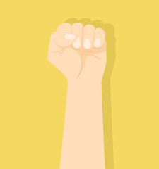 hand clenched fist on yellow background