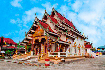 Fototapeta premium Golden Pagoda and Temple in Tha Wang Thong District, Phayao Province.