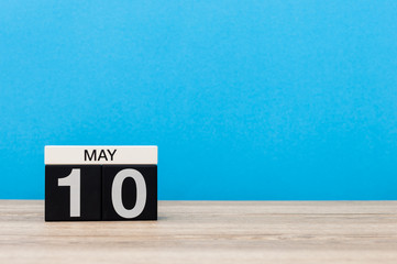 May 10th. Day 10 of month, calendar on turquoise background. Spring time, empty space for text. International or World Press Freedom Day