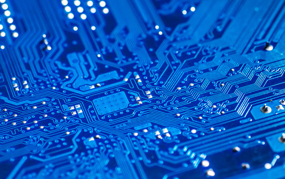 blue circuit board background of computer motherboard