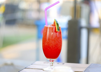 watermelon juice in glass on table