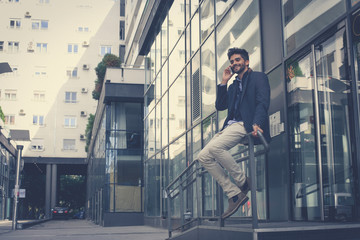 Fototapeta premium Business man talking on mobile phone.