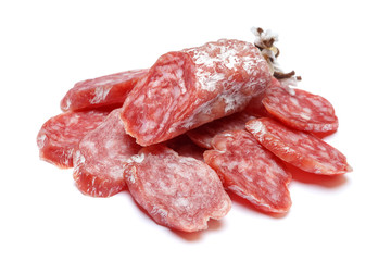 Dried organic salami sausage on white background