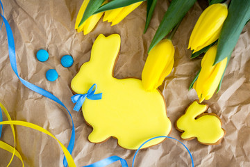 Fototapeta premium Easter ginger cookies in the shape of a yellow rabbit