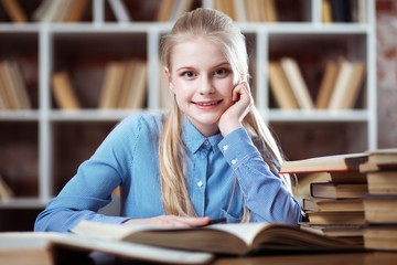 Teenage girl in a library