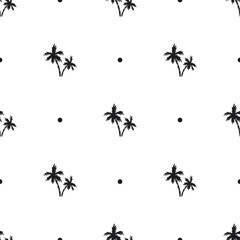 Seamless pattern of small black palm trees and dots on a white background