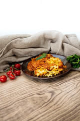 tasty fusilli pasta Italian meat sauce pasta on the table