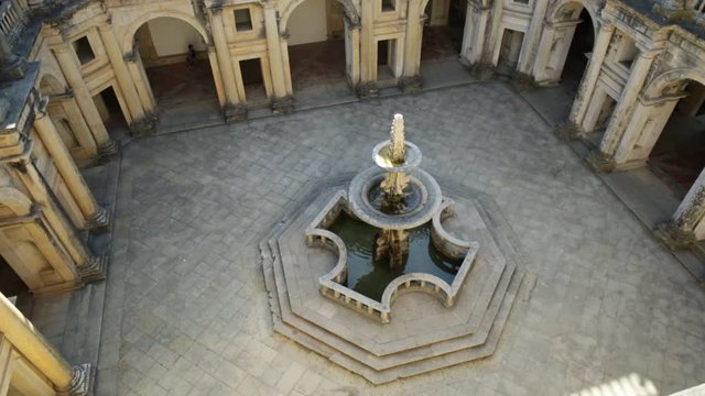 Portugal, Tomar. Aerial view of claustro de D. Joao III, courtyard with fountain of Convent of Christ in Templar Castle. Unesco Heritage and popular destination in Europe.