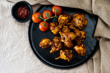 roasted sleeves chicken with potatoes and barbecue sauce