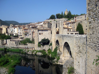 Fototapeta na wymiar View of the old city of Besalu, arch bridge, old town, sunny day, Catalonia, Spain