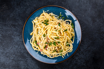 Spaghetti carbonara with egg and pancetta