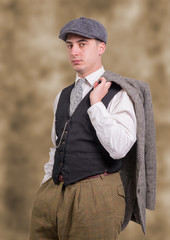 young man in vintage clothes with hat, 1940 style