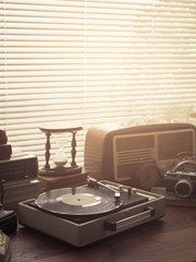 Vintage objects collection next to a window