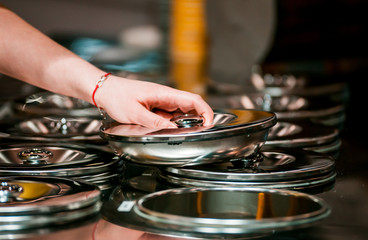 Woman behind counter of confectionery shop