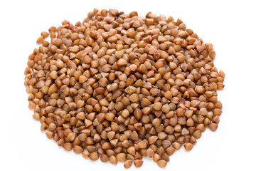 Buckwheat grains isolated on the white background.