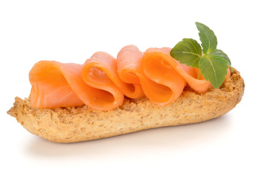 Bread with fresh salmon fillet isolated on white background, top view.