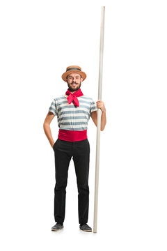 Caucasian man in traditional gondolier costume and hat
