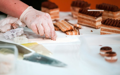 Preparing cake in pastry shop confiectionery industry