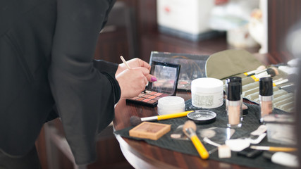 professional make-up artist at work